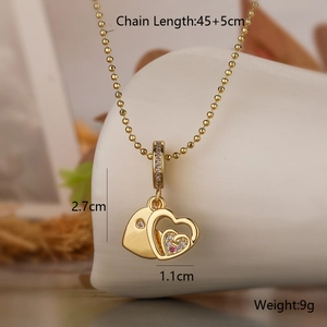 Detail of gold heart pendant necklace showing dimensions 2.7cm height and 45cm chain length