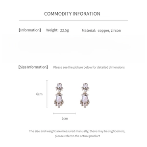 Detailed spec sheet showing vintage geometric square earrings size 6cm by 2cm and materials