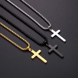 Triple set of stainless steel box chain necklaces with silver black and gold cross pendants