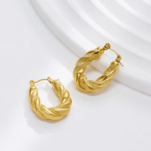 Golden twisted rope oval hoop earrings in polished stainless steel for a modern look
