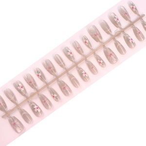 Press-on nail set featuring nude gray base with pink butterfly and floral patterns