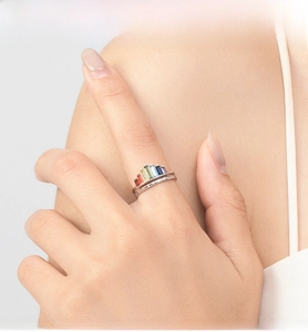 Close-up of S925 silver rainbow crown ring with stacked colorful baguette gemstones