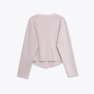 Back view of minimalist mauve soft knit cardigan with a rounded hem for women