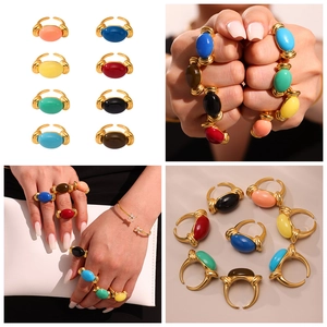 Detailed views of adjustable gold metal oval resin rings in various vibrant candy colors