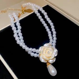 Collier double rang de perles élégant avec pendentif fleur en diamant et perle en goutte