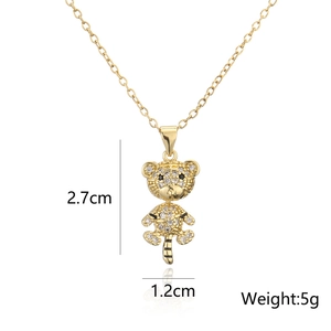 Detailed view of gold plated tiger pendant dimensions 2.7cm by 1.2cm and weight 5g