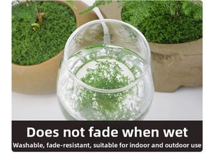Close-up of waterproof artificial green moss showing colorfast texture in water