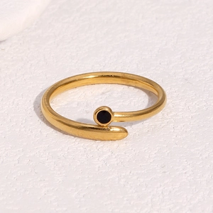Detail shot of 18k gold plated stainless steel open ring with black enamel inlay