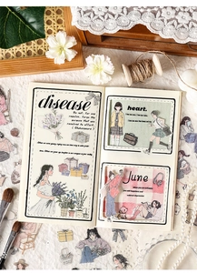 Detail of forest style stickers with girls and flowers for DIY journals on a notebook