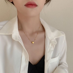 Elegant 18K gold-plated heart pendant on a delicate beaded chain necklace for women