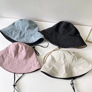 Foldable nylon bucket hats in four colors with adjustable windproof drawstrings