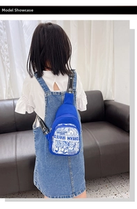 Rear view of a boy wearing a vibrant blue crossbody chest bag with stylish letter prints