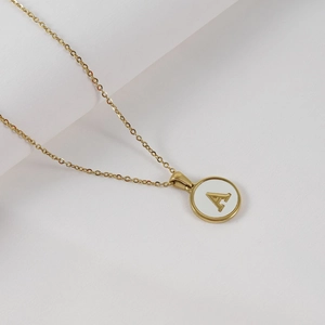 Minimalist 18K gold plated stainless steel necklace featuring a white shell letter A pendant