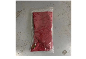 Folded red Christmas stocking with 3D Santa plush packed in clear plastic bag