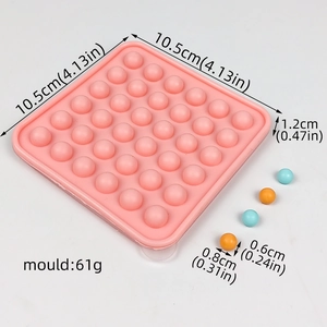 Pink silicone sphere mold dimensions 10.5x1.2cm with 61g weight and small round cavity details