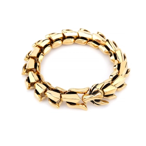 Detailed close-up of golden stainless steel keel chain bracelet with geometric links