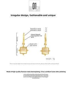 Detailed view of 18K gold plated hoop earrings featuring square cat eye stone pendants