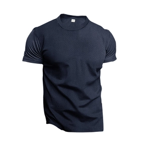Close-up of dark navy waffle knit fabric texture on a slim-fit crew neck sports T-shirt
