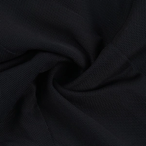 Macro shot of black mesh fabric showing detailed texture and subtle sheer waist material