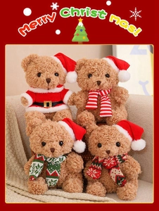 Close-up of four Christmas plush teddy bears with festive hats and colorful scarves