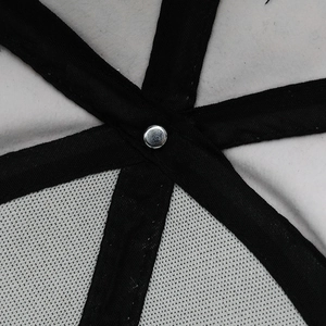 Detail of baseball cap interior showing reinforced black straps and breathable mesh fabric