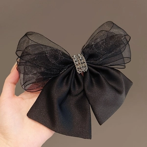 Elegant black mesh bow hair clip with luxury rhinestones and satin layers for women