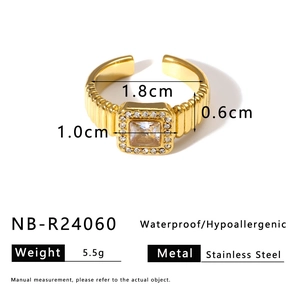 Detailed technical diagram showing dimensions and specs of the gold emerald zircon ring