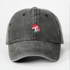 Vintage washed cotton baseball cap with red mushroom embroidery on a black denim base