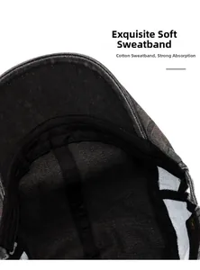 Detail view of the soft cotton sweatband inside a washed denim newsboy beret hat