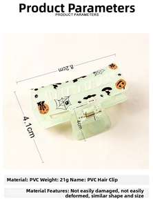 Detail view of Halloween PVC hair claw clip showing 8.2cm dimensions and spooky pumpkin patterns