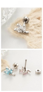Detailed close-up of leaf-shaped zircon stud earrings with secure screw-back closures