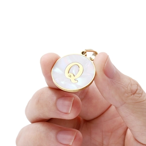 Golden 22mm round stainless steel letter Q pendant with mother of pearl inlay