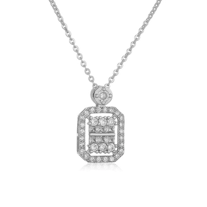 Macro detail of silver necklace featuring an octagonal pendant with pavé-set clear zircons