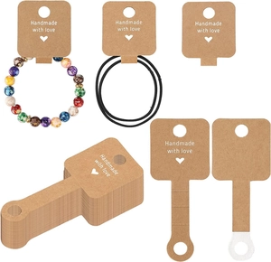 Brown kraft paper display cards with Handmade with Love text for bracelets and hair ties