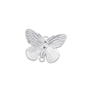 Detailed macro view of a silver butterfly charm connector with intricate textured wings