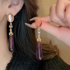 Gothic vintage gold earrings with champagne stone and purple resin teardrop pendant