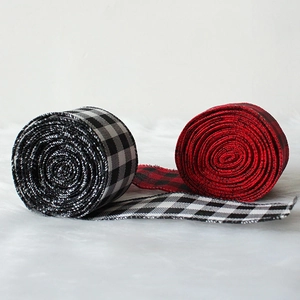 Christmas plaid ribbon rolls in black-white and red-black patterns for DIY gift wrapping
