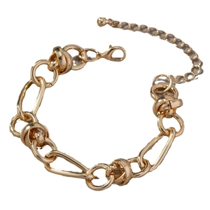 Men's fashion chunky gold chain bracelet featuring a unique knot element and lobster clasp