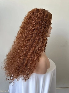 Long reddish brown curly wig with dense deep wave texture and voluminous hair