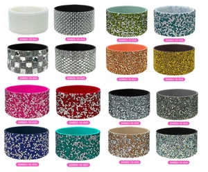 Detail showing various colors of rhinestone silicone boot protectors for water bottles
