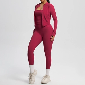 Three-piece workout set featuring zip jacket, sports bra and leggings in deep rose red