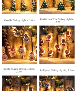Detail of Christmas LED string lights with Santa and tree motifs in warm yellow glow