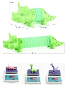 Detail showing retractable pop tube dinosaur toy dimensions and weight comparison