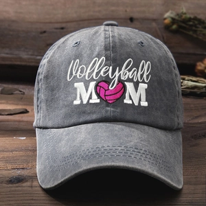 Washed dark gray baseball cap with Volleyball MOM embroidery and pink heart pattern