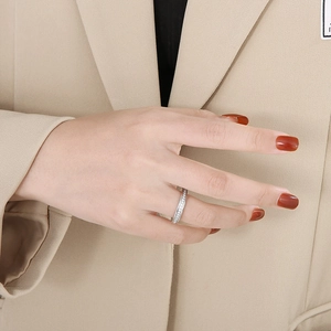 Elegant silver stainless steel ring with full micro-pave diamonds on female model hand