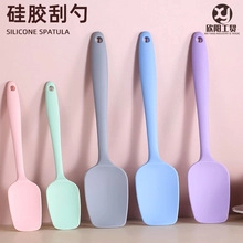 Five-piece heat-resistant silicone spatula set in assorted colors with hanging holes