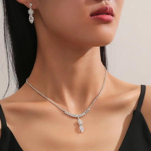 Elegant silver bridal jewelry set with sparkling zircon teardrop necklace and earrings