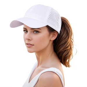 Detail view of white quick-dry baseball cap with laser-perforated mesh for ventilation