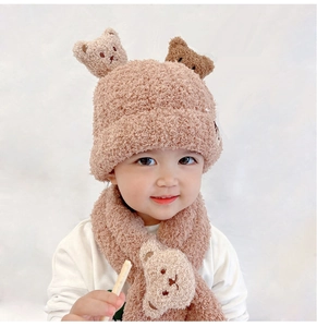 Detail of warm brown plush teddy bear hat and scarf set for infants and toddlers