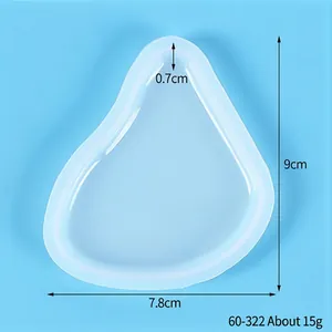 Detailed view of translucent heart-shaped puzzle silicone mold with dimension annotations